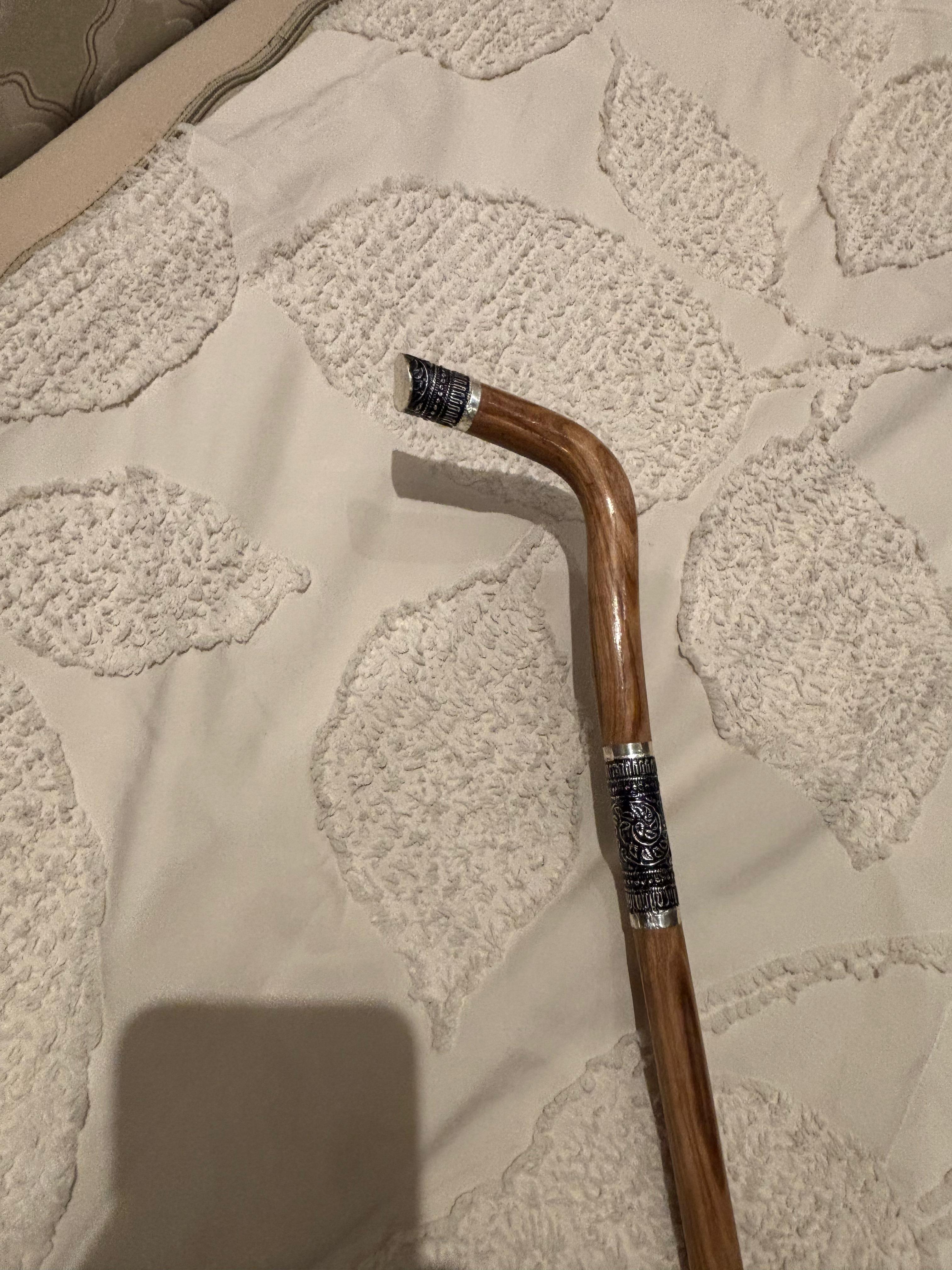 Handcrafted Wooden Walking Stick with Ornate Silver Detailing